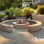 A fire pit in the middle of an outdoor patio.