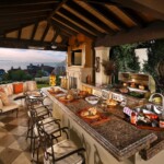 A large outdoor kitchen with an open view of the mountains.